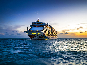 Cruise ship Aidaluna off the coast, sunset, Belize, Central America