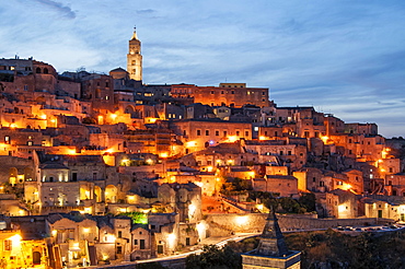 Cave houses of Sasso Caveoso at dusk, Sassi di Matera, Basilicata, Italy, Europe