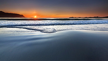 Sunset on the beach of Ramberg, Flakstad Flakstadoy, Lofoten, Nordland, Norway, Europe