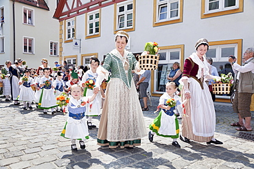 Women and children during a parade through the historic town centre, Fischerstechen or water jousting festival, Ulm, Baden-Wurttemberg, Germany, Europe