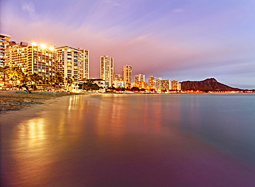 Waikiki Beach at dusk, Honolulu, Oahu, Hawaii, United States, North America