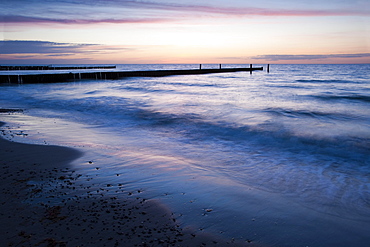 Groyne at sunset on the coast at, Nienhagen, Mecklenburg-Western Pomerania, Germany, Europe