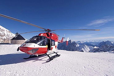 Red cross helicopter in the Zugspitze, highest point in Germany