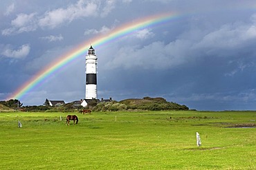 Lighthouse in Kampen with a rainbow shortly after a thundershower, Kampen, Sylt, North Frisia, Schleswig-Holstein, Germany, Europe