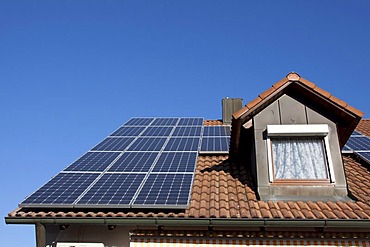 Solar panels on a house roof, photovoltaic