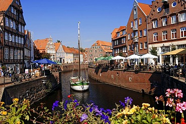 Ship in the old harbour and outdoor cafes, Stade, Lower Saxony, Germany, Europe