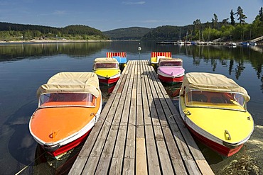 Colourful boats docked on a wharf, Schluchsee lake, Black Forest, Baden-Wuerttemberg, Germany, Europe