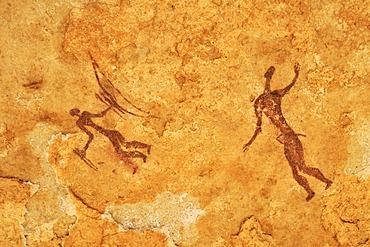 Painted warriors or hunters, neolithic rock art at Tin Meskis, Adrar n'Ahnet, Algeria, Sahara, North Africa