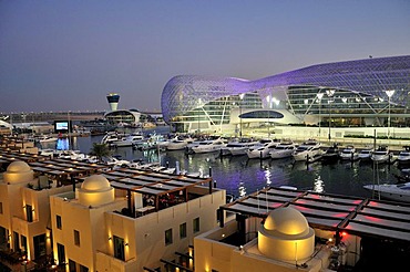 Yas Hotel and marina at the Formula One racetrack Yas Marina Circuit on Yas Island in the last daylight, Abu Dhabi, United Arab Emirates, Arabia, Asia