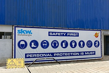 Safety sign of a joint venture with the German specialty chemicals company SKW Metallurgy in the industrial zone of Pasakha near Phuentsholing, Bhutan, Asia