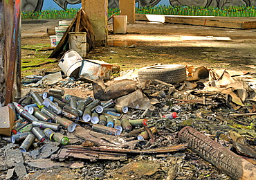 Aerosol cans, graffiti, abandoned factory