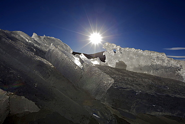 Sun shining on ice floes on a lake, Atacama Desert, Altiplano, southern Bolivia, South America