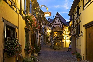 Alleyway with half-timbered houses in Eguisheim, Alsace, France, Europe