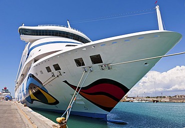 Brightly painted cruise ship, AIDA, in the port of Civitavecchia, Rome, Italy, Europe