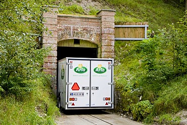 Cheese transporter passing narrow tunnel to the Monsted, Monsted limestone caves near Viborg, Jutland, Denmark, Europe