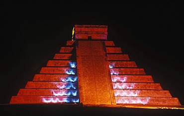 Pyramid of Kukulkan, illuminated red at night, Mayan ruins of Chichen Itza, Yucatan, Mexico, North America