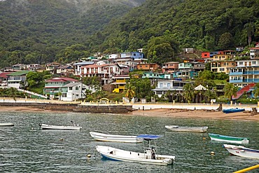 Boats, beach and colourful houses on the island of Isla Taboga, Panama, Central America