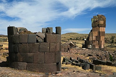 Burial towers called chullpas, of the Aymara people from the Colla culture above Lake Umayo near Puno, conquered by the Incas in the 15th Century and reused, Puno, Peru, South America