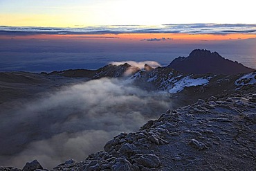 At sunrise, clouds in the crater of Mount Kilimanjaro, Tanzania, Africa