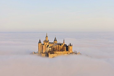 Burg Hohenzollern Castle with fog, autumn, Hechingen, Swabian Alb, Baden-Wuerttemberg, Germany, Europe