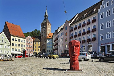 Main square with wooden sculptures by Josef Lang and Schmalzturm tower, Landsberg am Lech, Bavaria, Germany, Europe