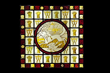 Stained glass roundel surrounded by quarries, depicting a fox and a goose, a scene from Reynard and the fox, designed and made by Clement James Heaton between about 1845-1855, Stained Glass Museum in Ely Cathedral, Ely, England, United Kingdom, Europe