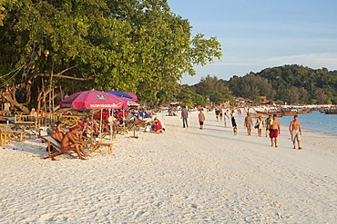 Tourists on Pattaya beach in late afternoon, Ko Lipe island, Thailand, Asia