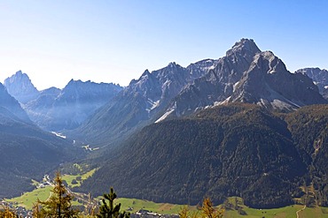 Sesto Dolomites in autumn, Mt Gsellknoten, Monte Casella, 2865m, and Mt Zwoelfer, Croda dei Toni, 3094m, Italy, Europe