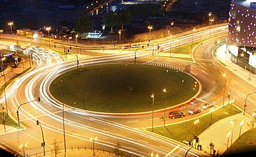 Roundabout in a town centre, light trails of vehicles at night, Berliner Platz Square, Essen, North Rhine-Westphalia, Germany, Europe