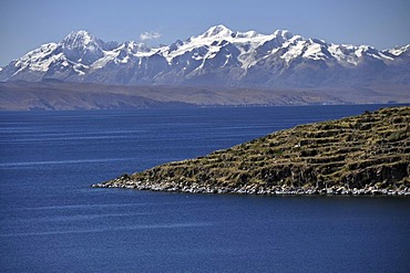 View from the Isla del Sol, Island of the Sun, in Lake Titicaca towards the Andes Mountains, Copacabana, Bolivia, South America