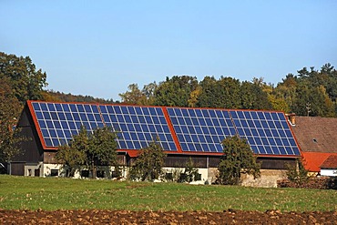 Photovoltaic system on the roof of farm buildings, Morschreuth, Upper Franconia, Bavaria, Germany, Europe