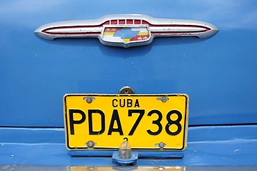 Blue 1950's vintage car in Cuba, rear view with licence plate, Greater Antilles, Caribbean, Central America, America