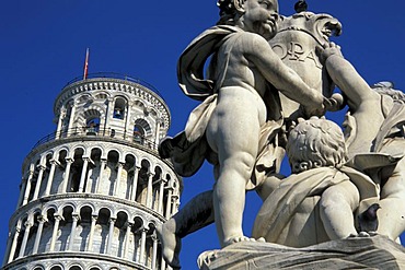 Leaning Tower of Pisa and a sculpture, Pisa, Tuscany, Italy, Europe