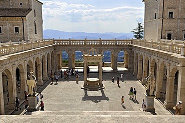 Cloister of Bramante with cistern and statues of St. Benedict and St. Scholastica, Benedictine abbey of Montecassino, Monte Cassino, Cassino, Lazio, Italy, Europe