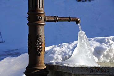 Icy fountain, Zernez, Engadin, canton of Grisons, Switzerland, Europe