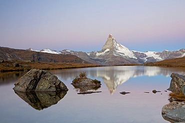 Early morning, dawn, on Stellisee Lake overlooking Mt Matterhorn, Zermatt, Valais, Swiss Alps, Switzerland, Europe, PublicGround