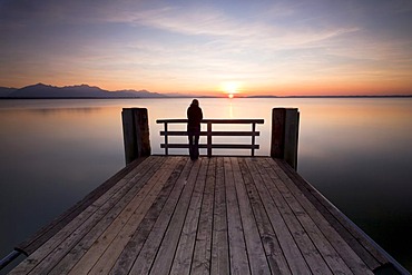 Woman on a dock in the evening light near Chieming on Lake Chiemsee, Bavaria, Germany, Europe, PublicGround