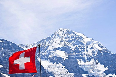 Swiss flag in the Jungfrau region, Switzerland, Europe