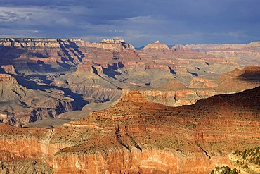 Thunderstorm brewing, view of Vishnu Temple Desert Palisades, Zoroaster Temple, Brahma Temple, Pattie's Butte at sunset from Yavapai Point, evening light, Grand Canyon National Park, South Rim, Arizona, United States of America, USA