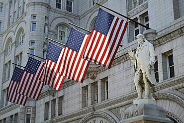 Benjamin Franklin statue in front of the Nancy Hanks Center, NEA, former Old Post Office Pavilion, US flags, Washington DC, District of Columbia, United States of America, PublicGround