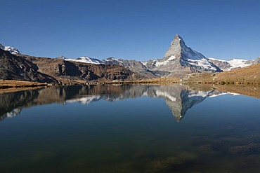 Mt Matterhorn, 4478 m, reflected in Stellisee Lake, Zermatt, Canton Valais, Switzerland, Europe, PublicGround