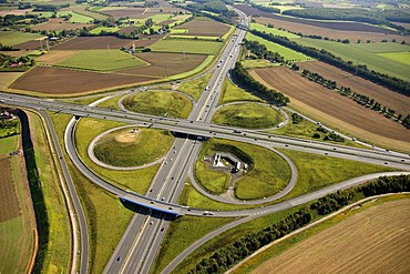 Aerial view, ADAC monument to honour the Yellow Angels, artist Alex Gockel, at the Kamener Kreuz, cross junction of the A1 and A2 motorways, Kamen, Ruhr Area, North Rhine-Westphalia, Germany, Europe