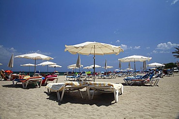 Sunbeds and sunshades on the beach of Santa Eulalia, Ibiza, Balearic Islands, Spain, Europe