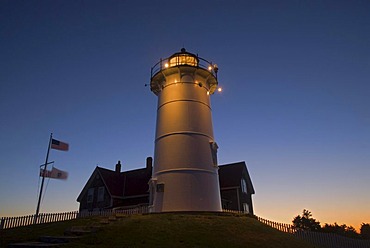 Sunrise behind Nobska Lighthouse near Woods Hole on Cape Cod, Massachusetts, USA