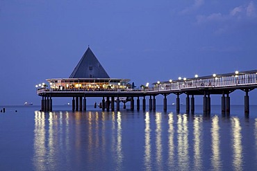 Illuminated pier at dusk, magic hour, seaside resort of Heringsdorf, Usedom island, Baltic Sea, Mecklenburg-Western Pomerania, Germany, Europe