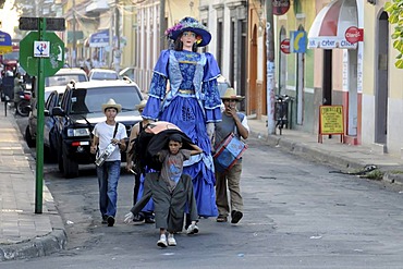 Parade, youth playing music, drama, history, fundraising, Leon, Nicaragua, Central America