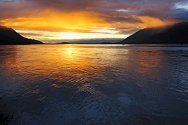 Sunset over Knik River, Chugach Mountains, Alaska, USA, North America