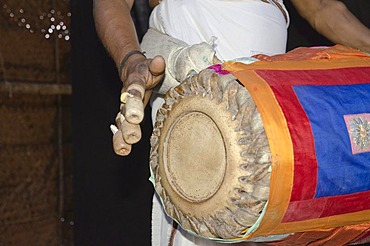 Drummer at Kathakali performance, Perratil, Kerala, India, Asia