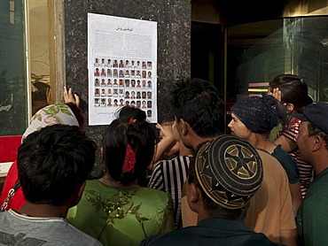 Uigurs looking for their missed family members after the riots in Kashgar in July 2009, Xinjiang, China, Asia