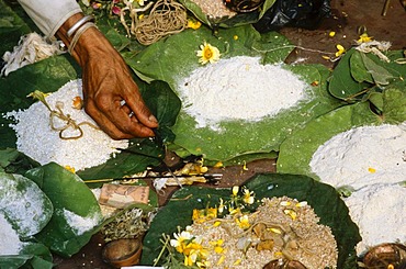 A small ritual as part of the praying ritual for the good reincarnation of a dead person, Haridwar, Uttarakhand, formerly Uttaranchal, India, Asia